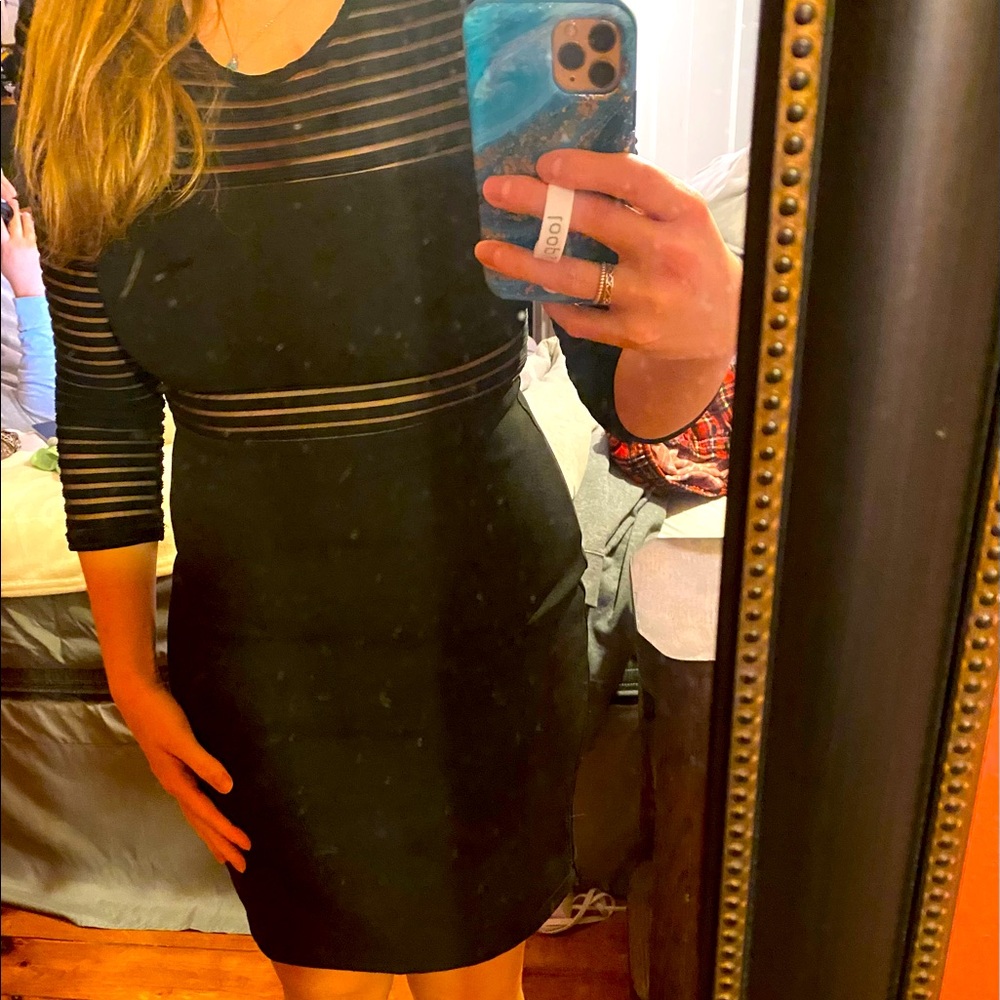 Black fitted cocktail dress from Lulus. Size medium. Never worn
